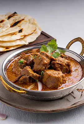 rogan-josh-with-naan-bread.webp